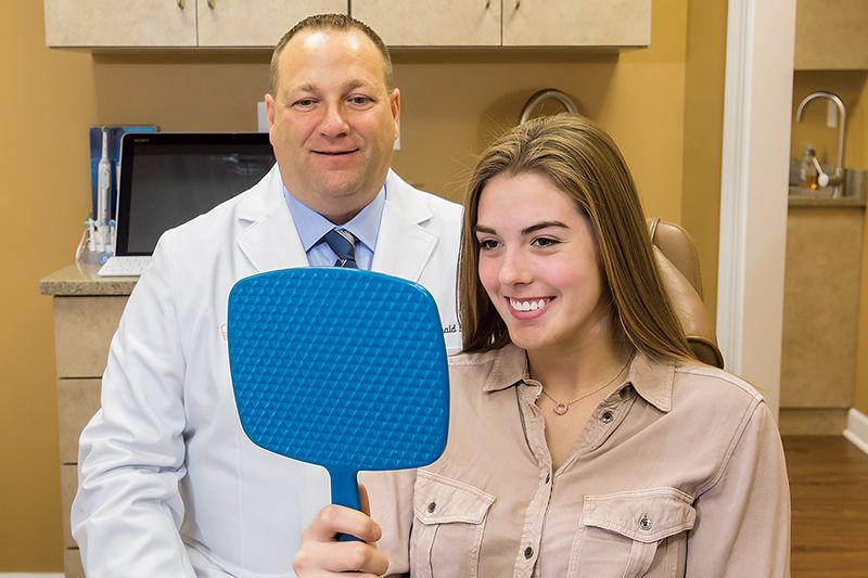 Cosmetic gum treatment patient smiling